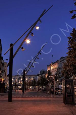 Royalty free stock image of Cork City Patrick Street Santa and Cole lights at dusk 