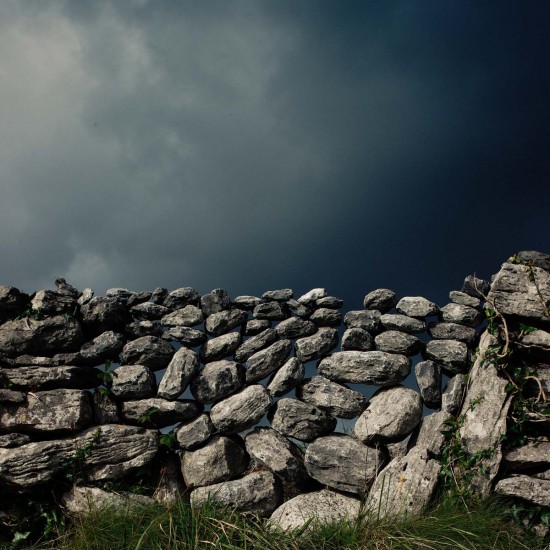 Fine art print of wall with storm clouds