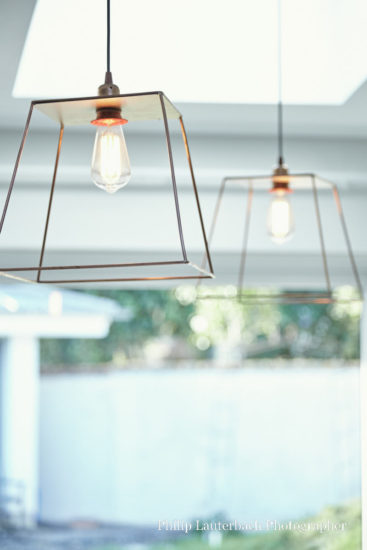 Open plan kitchen pendant copper lighting