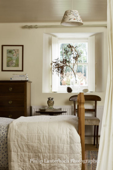 Bedroom bed timber ceiling pendant light window timber shutters dresser