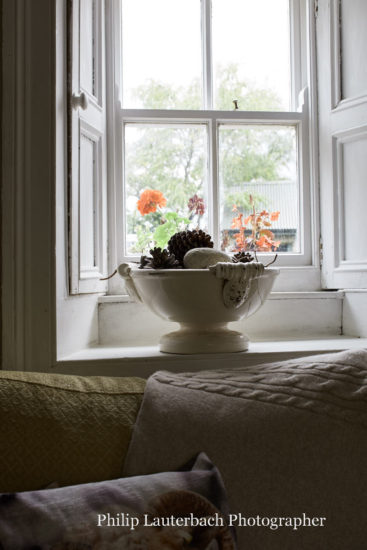 Living room detail of window sill timber shutters