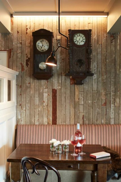 Bar seating tables timber panels pendant lighting