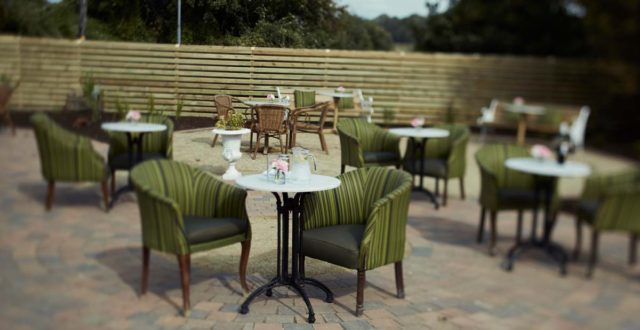 Exterior garden area patio seating flowers