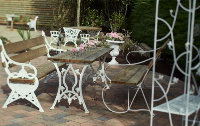 Exterior garden area patio seating flowers